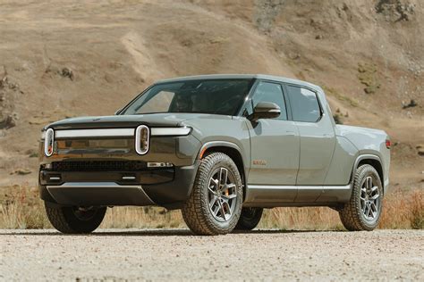 Rivian electric car - R1S and model Y are two different cars but I bet both are being considered by many mid size families who want to go electric. Model Y is becoming more attractive for the following: charging infrastructure, Teslas software integration, and the fact that Tesla is more mature than Rivian and have more service centers.